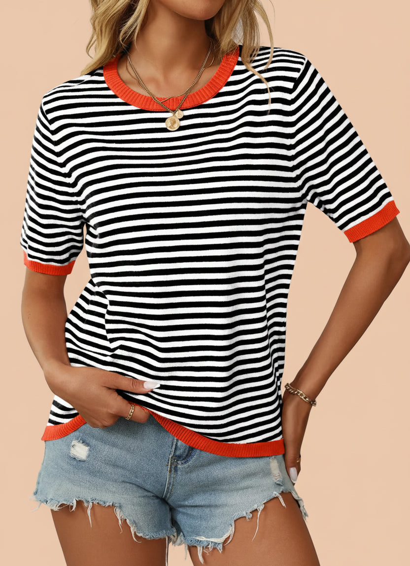 Striped half sleeve knit top in black and white stripes - front view